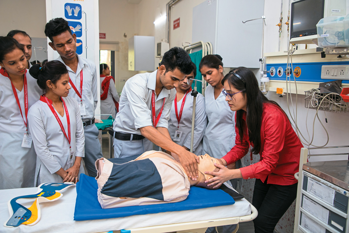 Above: The students learn the basics of paramedics through 11 courses offered by
the TMF Healthcare Academy.